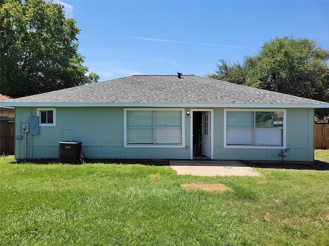 3534 Churchill Gardens Ln, Houston, TX 77066 - back of house with a shingled roof, a patio, and central AC
