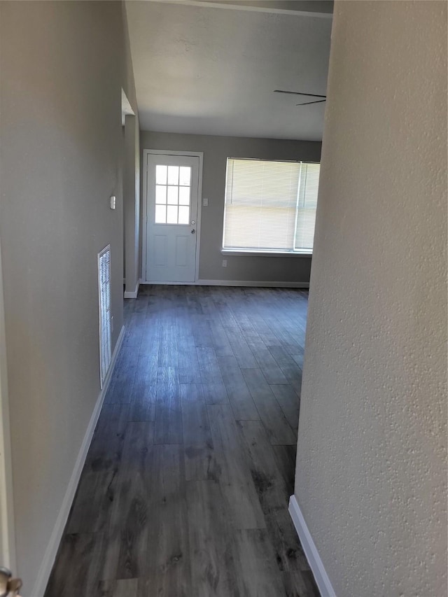 3534 Churchill Gardens Ln, Houston, TX 77066 - hallway with wood finished floors, baseboards, and a textured wall
