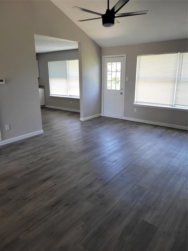 3534 Churchill Gardens Ln, Houston, TX 77066 - unfurnished living room featuring lofted ceiling, ceiling fan, dark wood-style floors, and baseboards