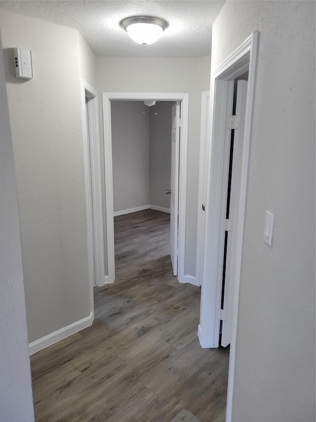 3534 Churchill Gardens Ln, Houston, TX 77066 - hallway with wood finished floors and baseboards