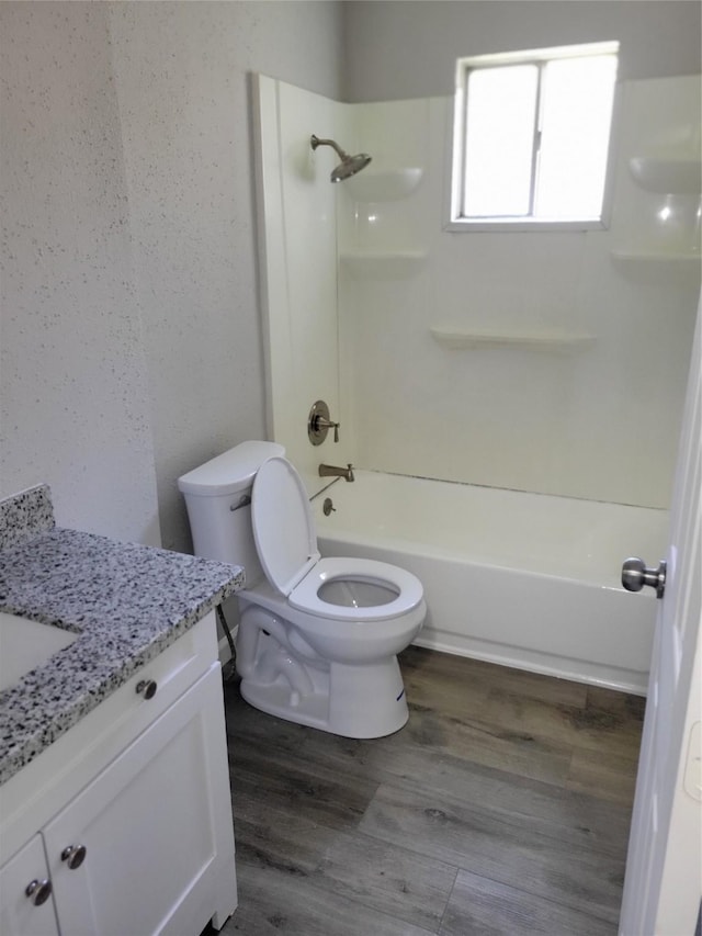 3534 Churchill Gardens Ln, Houston, TX 77066 - full bathroom featuring toilet, vanity,  shower combination, and wood finished floors