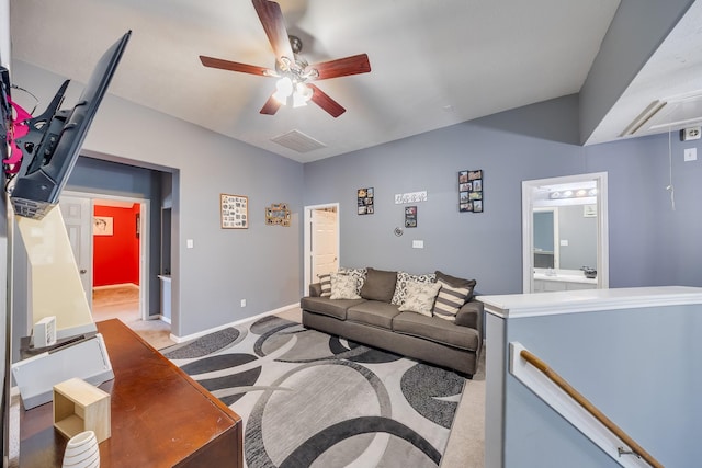 17611 Wind Mist Ln, Cypress, TX 77433 - living area with ceiling fan, light carpet, and baseboards