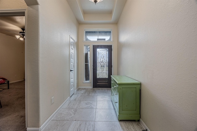 214 San Bernard Dr, Baytown, TX 77523 - entryway featuring a ceiling fan and baseboards