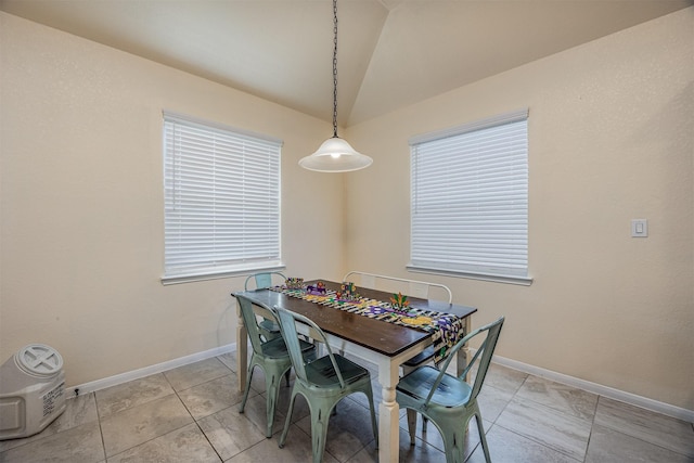 214 San Bernard Dr, Baytown, TX 77523 - dining area with lofted ceiling and baseboards