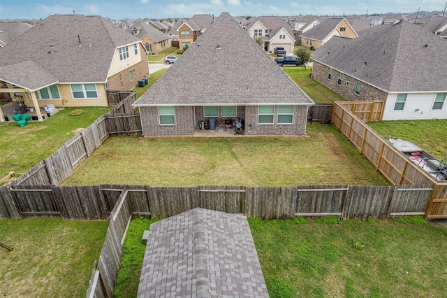 214 San Bernard Dr, Baytown, TX 77523 - rear view of property featuring brick siding, a residential view, and a patio area