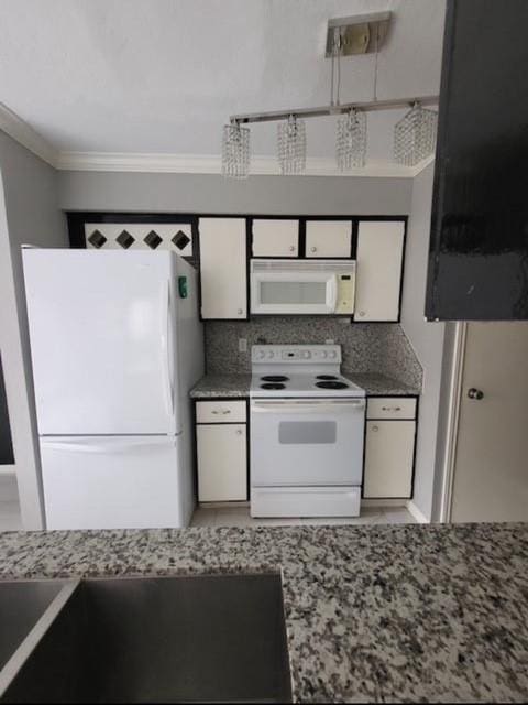 2211 S Kirkwood Rd Unit 69, Houston, TX 77077 - kitchen with white appliances, white cabinets, crown molding, backsplash, and light stone counters