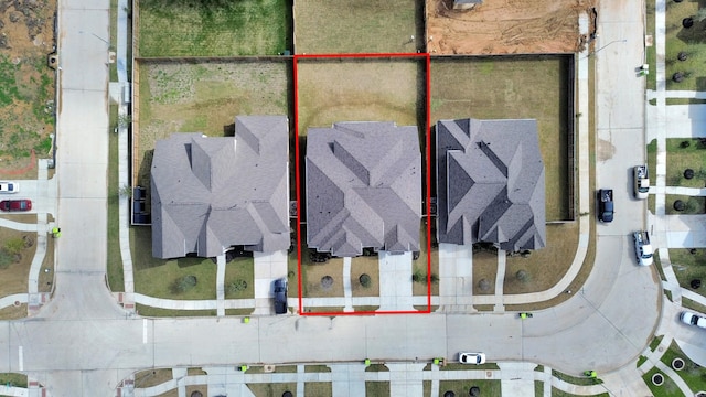 aerial view of property and surrounding area with property parcel outlined