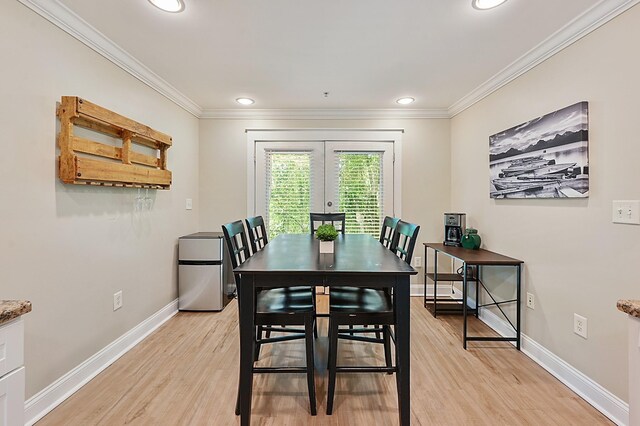 1725 Harvey Mitchell Pkwy S Unit 211, College Station, TX 77840 - dining room featuring french doors, light wood-type flooring, ornamental molding, baseboards, and recessed lighting