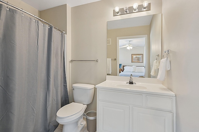 1725 Harvey Mitchell Pkwy S Unit 211, College Station, TX 77840 - ensuite bathroom with toilet, a ceiling fan, and vanity