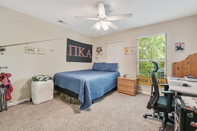 1725 Harvey Mitchell Pkwy S Unit 211, College Station, TX 77840 - bedroom with carpet flooring, baseboards, ceiling fan, and an office area