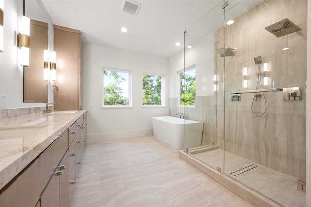 966 Lamonte Ln, Houston, TX 77018 - bathroom with a shower stall, a soaking tub, baseboards, double vanity, and recessed lighting