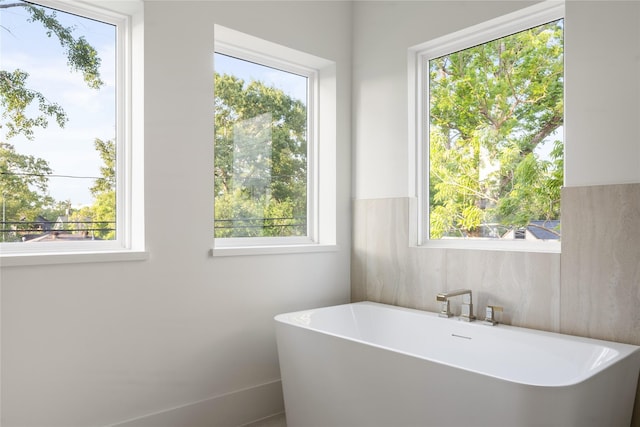 966 Lamonte Ln, Houston, TX 77018 - full bathroom featuring healthy amount of natural light and a soaking tub