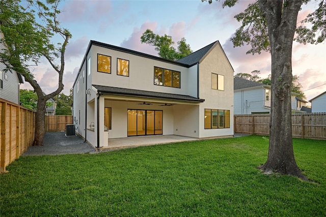 966 Lamonte Ln, Houston, TX 77018 - rear view of house featuring stucco siding, a patio, cooling unit, and ceiling fan