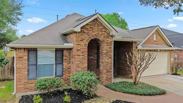 view of front of house featuring brick siding