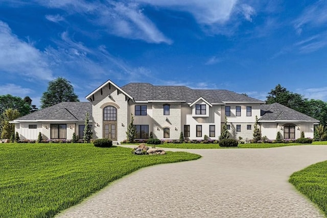 french country style house featuring a front yard