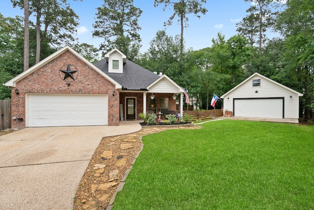 2838 Sunburst Ln, Montgomery, TX 77356 - view of front of home with brick siding, covered porch, roof with shingles, and an outdoor structure