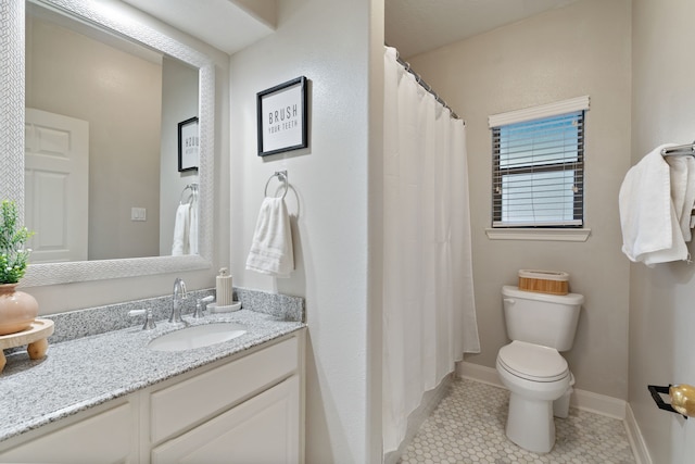 2838 Sunburst Ln, Montgomery, TX 77356 - bathroom featuring toilet, vanity, tile patterned flooring, a shower with curtain, and baseboards
