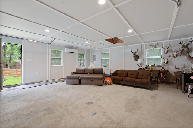 2838 Sunburst Ln, Montgomery, TX 77356 - living area featuring unfinished concrete floors, plenty of natural light, recessed lighting, and an AC wall unit