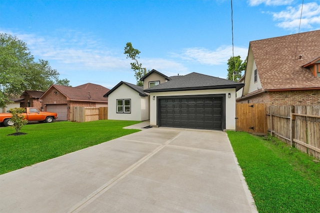 view of front of property with stucco siding and concrete driveway