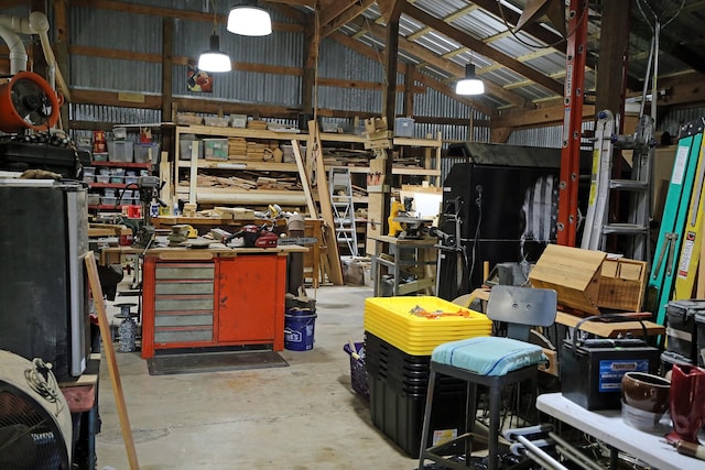 15402 Maple St, Santa Fe, TX 77517 - garage featuring a workshop area