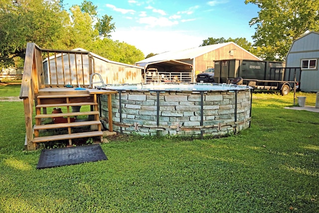 15402 Maple St, Santa Fe, TX 77517 - view of green lawn with an outdoor structure