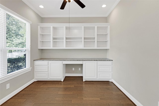 28116 Chuckwagon Trl, Magnolia, TX 77355 - unfurnished office featuring built in desk, plenty of natural light, ceiling fan, crown molding, and dark wood finished floors