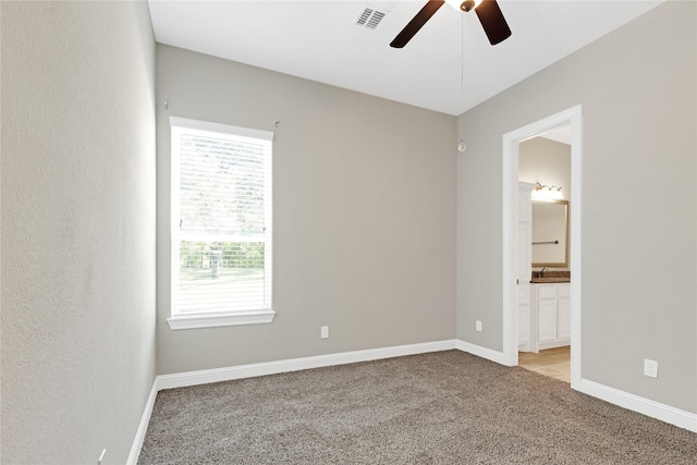 28116 Chuckwagon Trl, Magnolia, TX 77355 - unfurnished room featuring a ceiling fan, light colored carpet, and baseboards