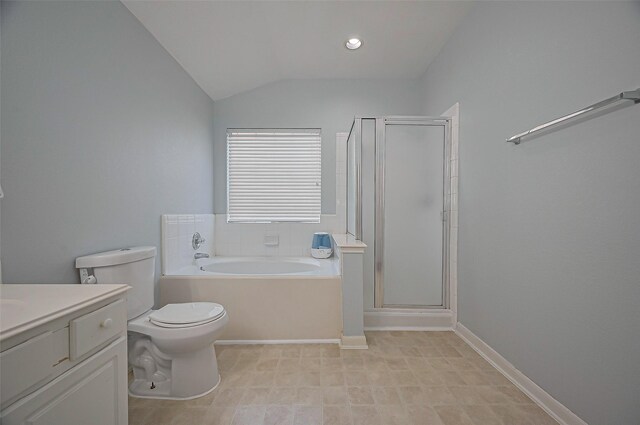 bathroom with lofted ceiling, a shower stall, a bath, toilet, and vanity