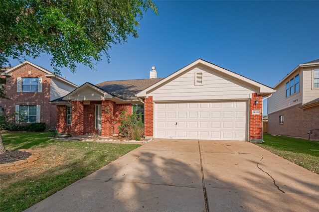 view of front of house featuring brick siding, a front lawn, a chimney, concrete driveway, and a garage