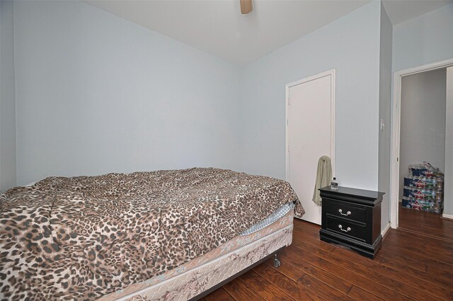 bedroom featuring hardwood / wood-style floors and a ceiling fan