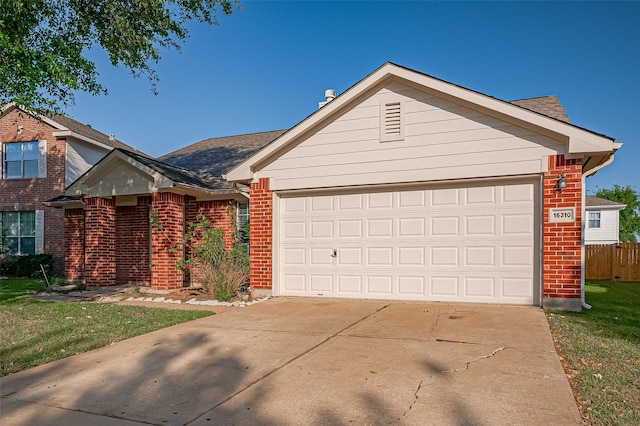 single story home with brick siding, driveway, an attached garage, and a shingled roof
