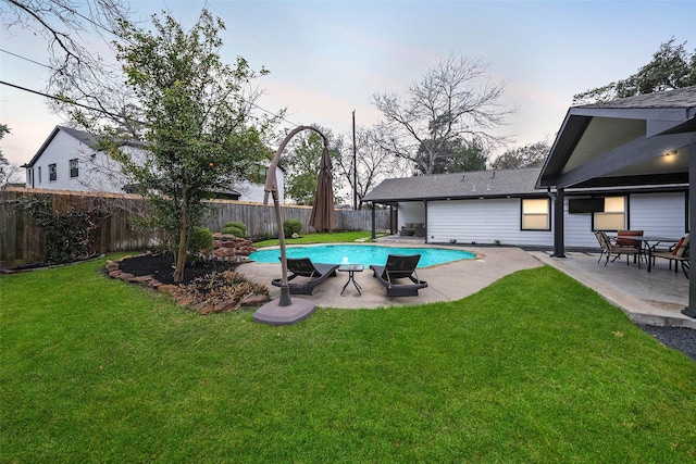 1403 Chantilly Ln, Houston, TX 77018 - pool at dusk featuring a patio area
