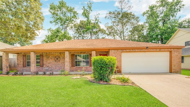 9024 Zapata Way, Willis, TX 77378 - ranch-style home featuring a garage, concrete driveway, a front yard, brick siding, and roof with shingles