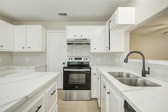 9024 Zapata Way, Willis, TX 77378 - kitchen featuring stainless steel electric range, a sink, under cabinet range hood, and white cabinets