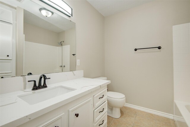 9024 Zapata Way, Willis, TX 77378 - bathroom featuring baseboards, toilet, tile patterned floors, vanity, and bathing tub / shower combination