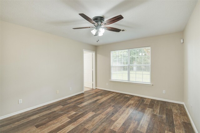 9024 Zapata Way, Willis, TX 77378 - spare room with wood finished floors, ceiling fan, and baseboards