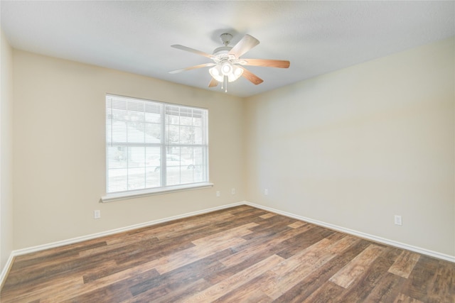 9024 Zapata Way, Willis, TX 77378 - empty room featuring wood finished floors, baseboards, and ceiling fan