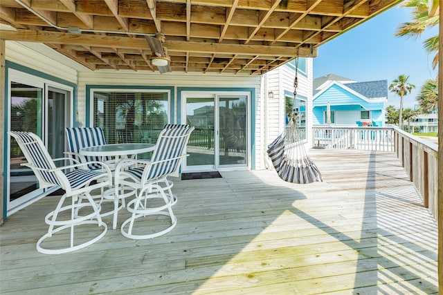 deck featuring outdoor dining area