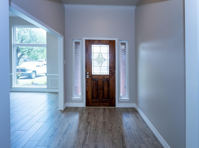 2414 Shoal Creek Dr, League City, TX 77573 - foyer entrance featuring wood finished floors and baseboards