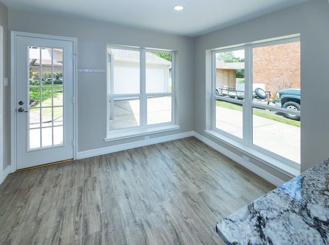 2414 Shoal Creek Dr, League City, TX 77573 - entryway featuring baseboards, wood finished floors, and recessed lighting