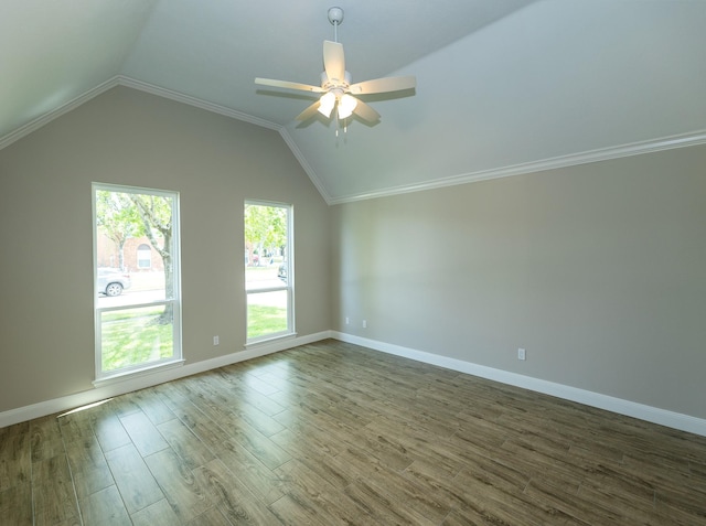2414 Shoal Creek Dr, League City, TX 77573 - spare room with ceiling fan, wood finished floors, vaulted ceiling, and baseboards