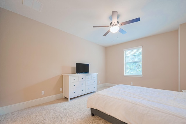 12607 Cove Landing Dr, Cypress, TX 77433 - bedroom with baseboards, carpet, and ceiling fan