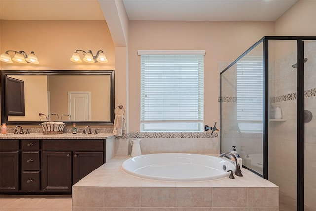 12607 Cove Landing Dr, Cypress, TX 77433 - full bathroom with a garden tub, a stall shower, and double vanity