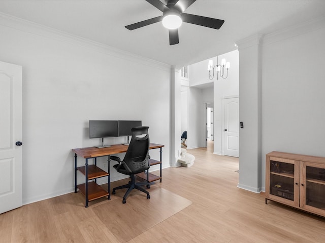 office featuring a ceiling fan, light wood-type flooring, and ornamental molding