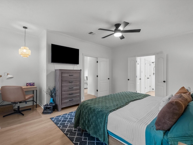 bedroom with light wood-type flooring, ornamental molding, and ceiling fan