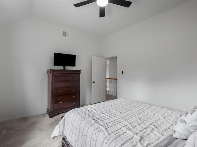 bedroom featuring lofted ceiling, carpet, and ceiling fan