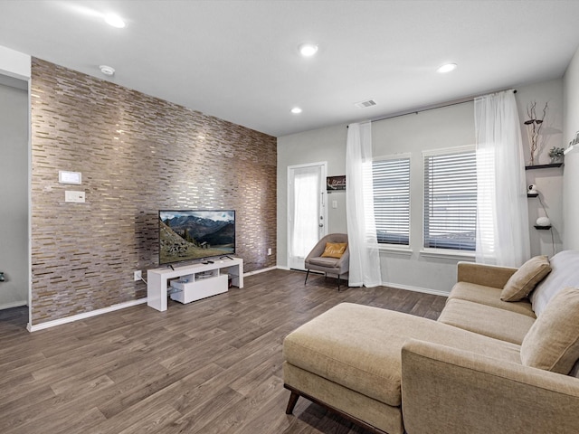 2419 Norwood Stand Trl, Spring, TX 77373 - living room featuring baseboards, wood finished floors, recessed lighting, and an accent wall