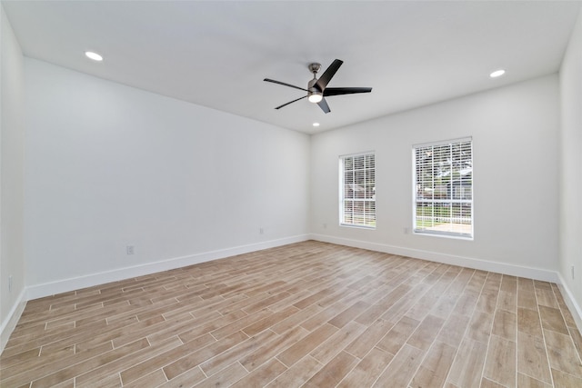 1003 Kelley St, Houston, TX 77009 - unfurnished room with ceiling fan, light wood-style floors, recessed lighting, and baseboards