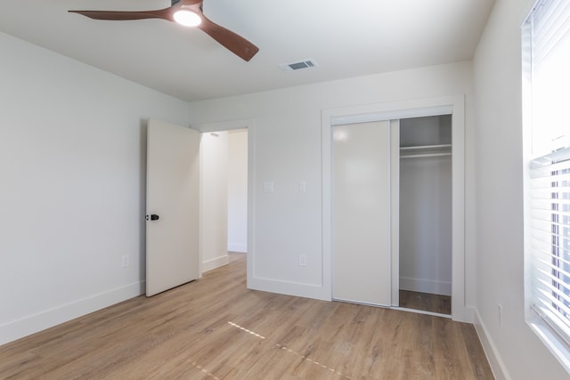 1710 Hafner Dr, Houston, TX 77055 - unfurnished bedroom with light wood-style floors, a closet, baseboards, and a ceiling fan