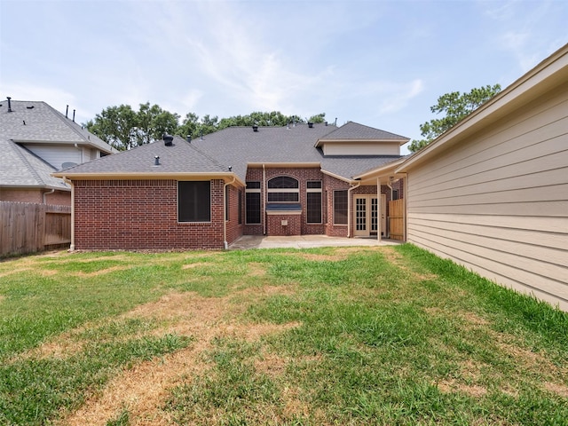 23334 Fairbranch Dr, Katy, TX 77494 - back of house featuring brick siding, a patio, and a shingled roof